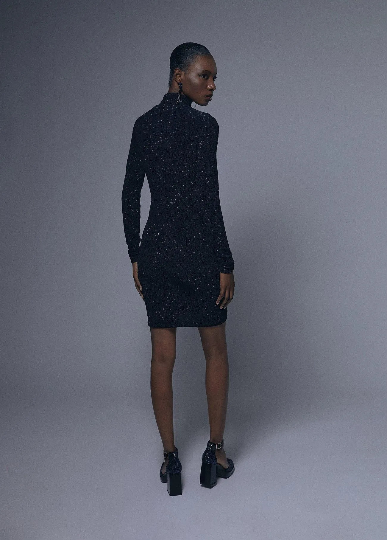 Draped dress with shoulder pads detail